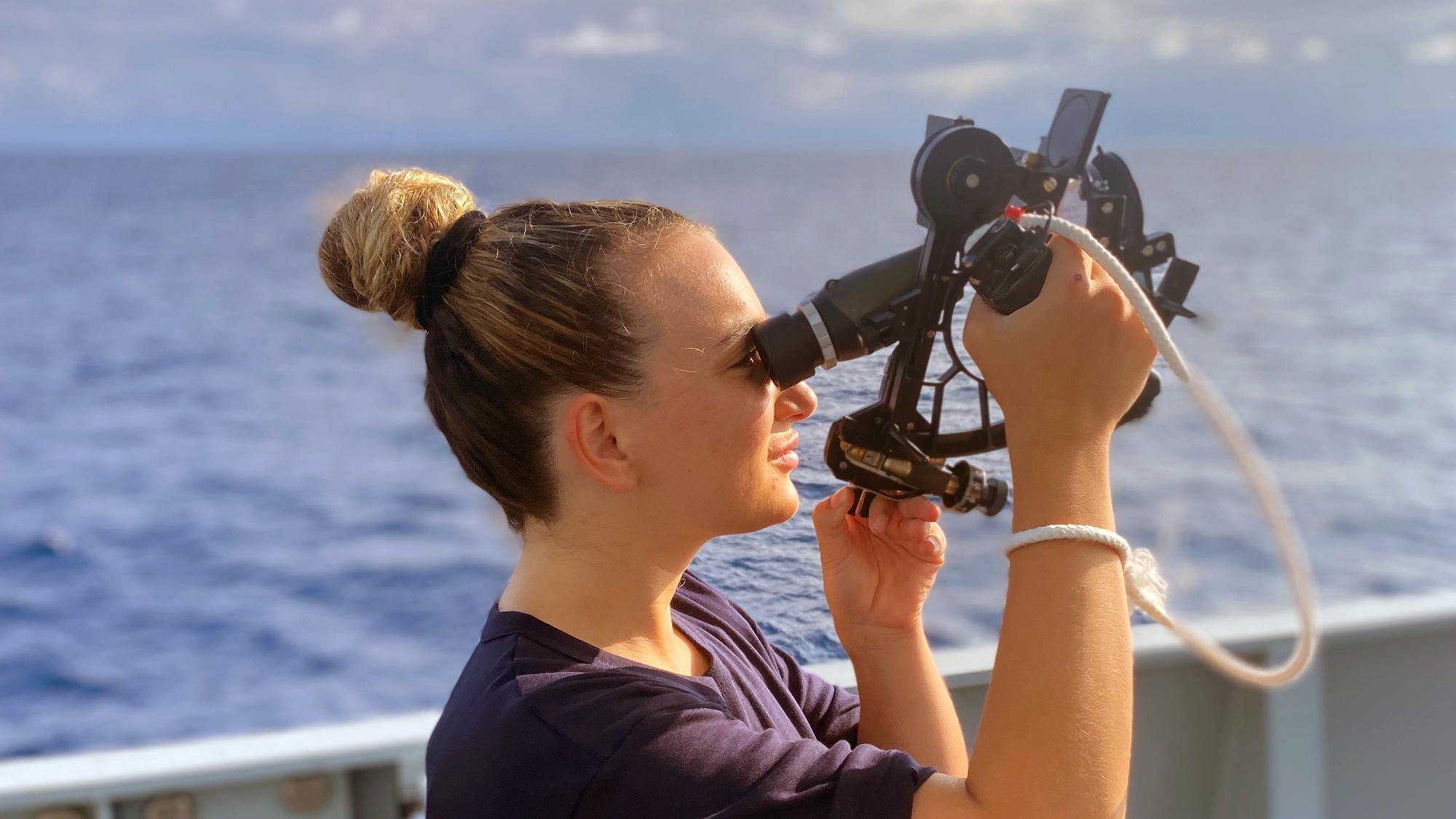 Cadet Scarlett Barnett-Smith taking a navigational fix aboard HMS Tamar [crop].jpg